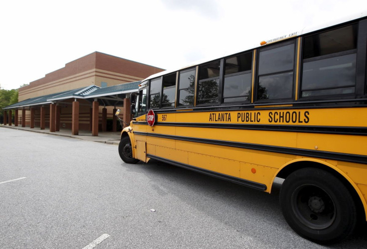 An Atlanta Public Schools bus is parked at Dobbs Elementary School in Atlanta, Georgia April 14, 2015. 