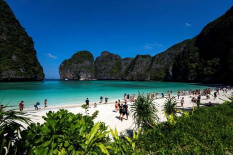 Tourists visit Maya bay after Thailand reopened its world-famous beach after closing it for more than three years to allow its ecosystem to recover from the impact of overtourism, at Krabi province, Thailand, January 3, 2022. Picture taken January 3, 2022