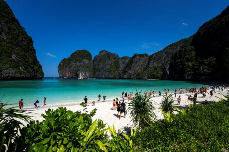 Tourists visit Maya bay after Thailand reopened its world-famous beach after closing it for more than three years to allow its ecosystem to recover from the impact of overtourism, at Krabi province, Thailand, January 3, 2022. Picture taken January 3, 2022