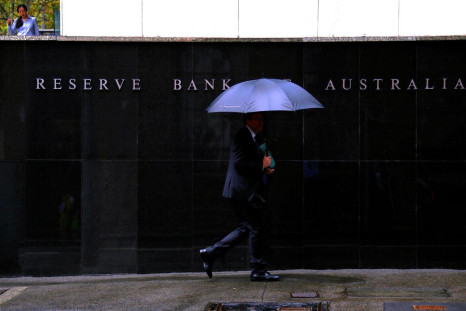 Pedestrians walk past the Reserve Bank of Australia building in central Sydney, Australia, March 7, 2017.     