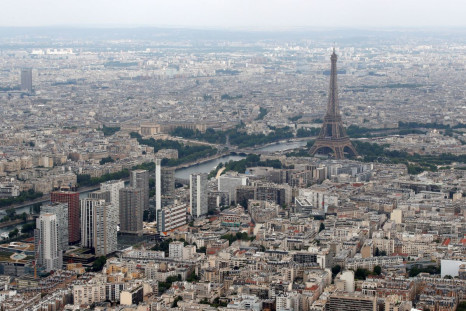 An aerial view shows the Eiffel tower, the Seine River and the Paris skyline, France, July 14, 2019. 
