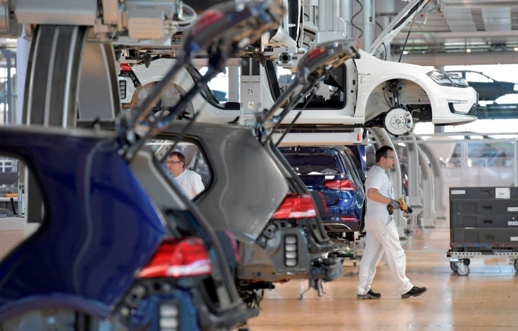 Mechanic staff work on the production line of Volkswagen e-Golf in the Glaeserne Manufaktur plant in Dresden, Germany May 8, 2018.