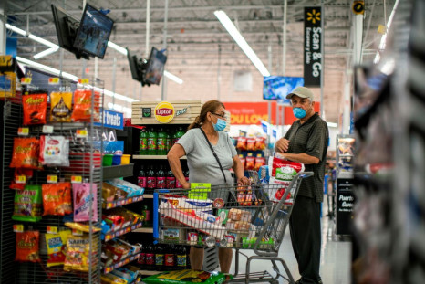Shoppers are seen wearing masks while shopping at a Walmart store, in North Brunswick, New Jersey, U.S. July 20, 2020. 