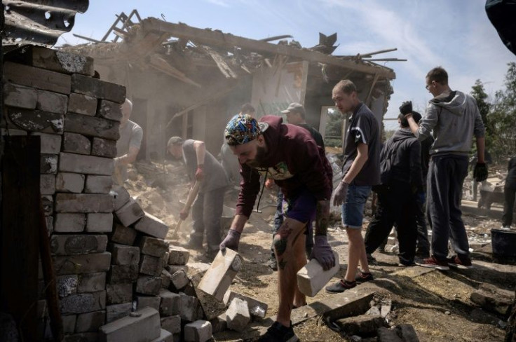 'If we can help, why not,' says one volunteer, repeating a phrase heard across Ukraine as people have turned out to help their fellow citizens