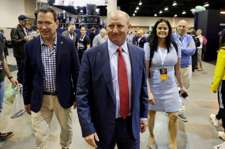 Gregory Abel, the CEO of Berkshire Hathaway Energy and who is designated to succeed Warren Buffett as Berkshire CEO, walks through the crowd at the first in-person annual meeting since 2019 of Berkshire Hathaway Inc in Omaha, Nebraska, U.S. April 29, 2022