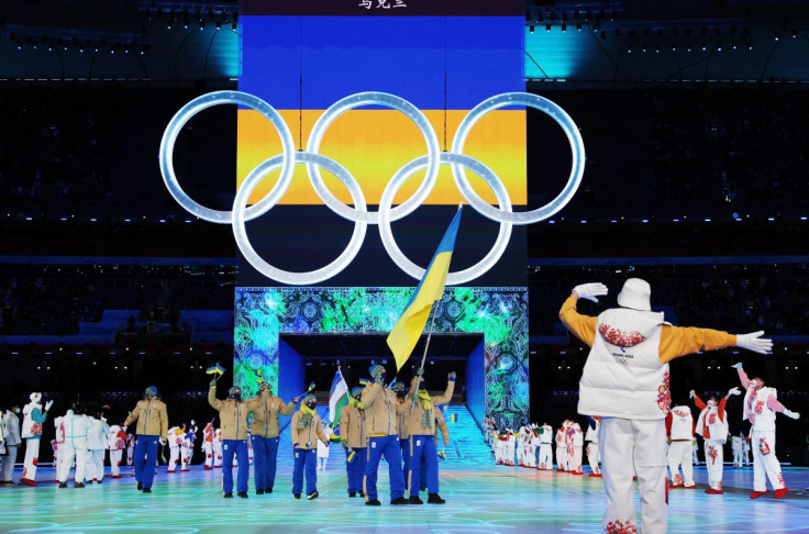 2022 Beijing Olympics - Opening Ceremony - National Stadium, Beijing, China - February 4, 2022.  Flag bearers Alexandra Nazarova of Ukraine and Oleksandr Abramenko of Ukraine during the athletes parade at the opening ceremony. 