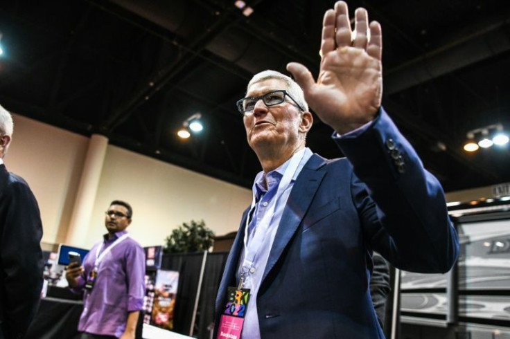 Apple CEO Tim Cook arrives at the Berkshire Hathaway shareholders meeting in Omaha, Nebraska on April 30, 2022; he was one of thousands of shareholders gathering to hear from investment guru Warren Buffett