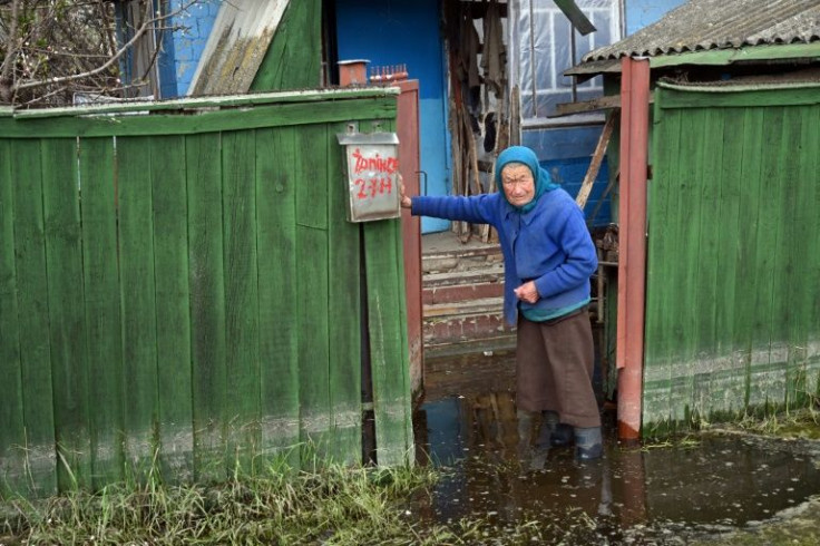 Maria Didovets, 82, is still waiting for all the water to be pumped out of her basement which was flooded when a Russian strike hit a nearby dam two months ago