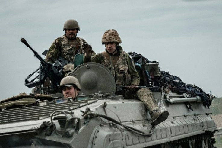 Ukrainian soldiers on an armoured personnel carrier in Sloviansk, eastern Ukraine, on April 29, 2022.