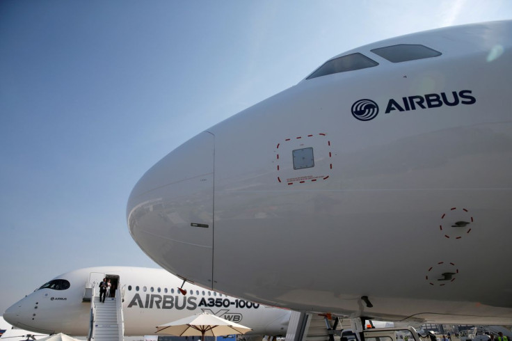 An Airbus A350-1000 Xwb (back) and an Airbus A321neo are seen on static display during the 52nd Paris Air Show at Le Bourget Airport near Paris, France, June 22, 2017.