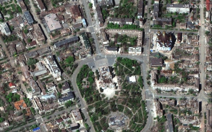 A handout satellite image shows destroyed buildings around the city centre in Mariupol