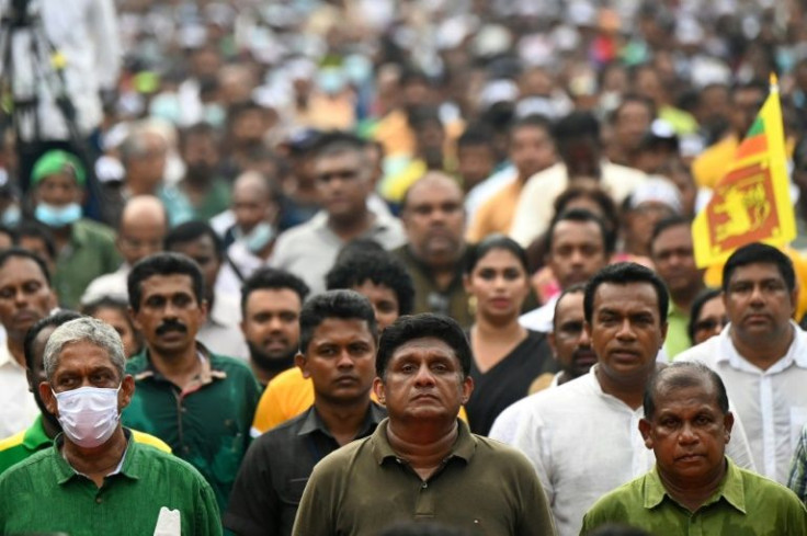 Sajith Premadasa (C), leader of main Sri Lankan opposition party the SJB, takes part in a May Day rally in Colombo on Sunday calling for the ouster of President Gotabaya Rajapaksa