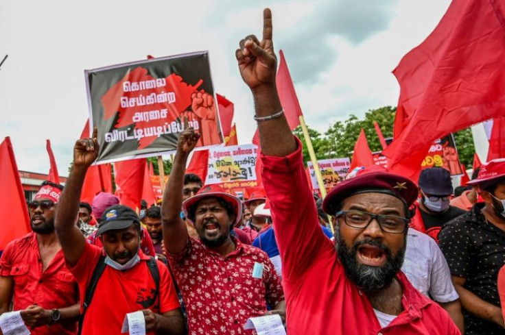 Activists and supporters of Sri Lanka's leftist JVP party called for the country's president to resign at a May Day rally in Colombo on Sunday