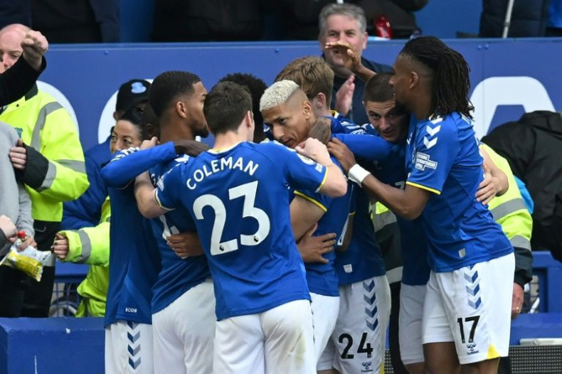 Everton's Brazilian striker Richarlison (centre) celebrates his goal against Chelsea