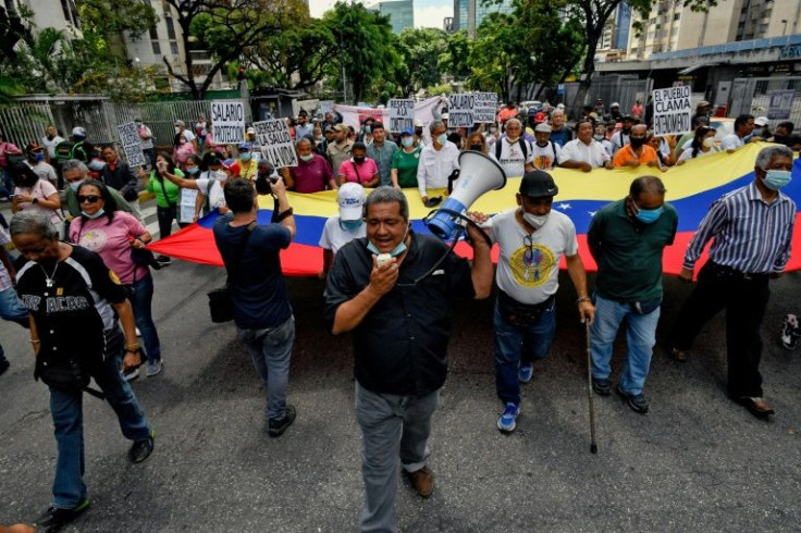 Workers of the healthcare union demonstrate against the Venezuelan government of President Nicolas Maduro during a May Day (Labour Day) rally to mark the international day of the workers, in Caracas, on May 1, 2022