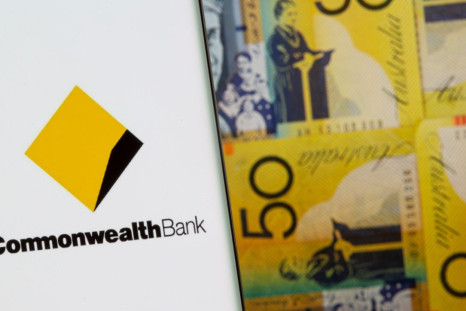 Commonwealth Bank logo is seen on a smartphone in front of displayed Australian dollar banknotes in this illustration taken, November 8, 2021. 