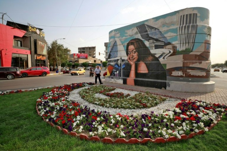 A mural of Iraqi architect Zaha Hadid, painted by Iraqi artist Wijdan al-Majed -- part of an initiative aiming to 'bring beauty to the city' of Baghdad