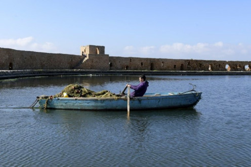 A Tunisian fisherman enters port in Ghar el-Melh; fishing makes up 13 percent of Tunisia's GDP, and nearly 40 percent of it is done around seagrass meadows
