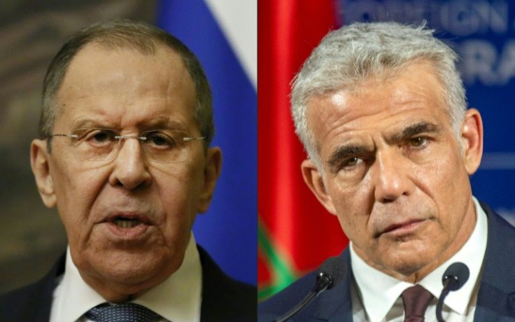 Israeli Foreign Minister Yair Lapid (R) on May 2, 2022 slammed his Russian counterpart Sergei Lavrov (L) for alleging Adolf Hitler may have "had Jewish blood" and summoned Moscow's ambassador for "clarifications"
