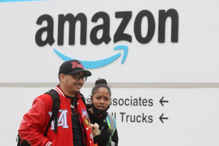 Amazon workers walk outside Amazonâs LDJ5 sortation center, as employees begin voting to unionize a second warehouse in the Staten Island borough of New York City, U.S. April 25, 2022. 