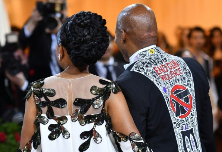 New York City Mayor Eric Adams, wearing a jacket emblazoned with "End Gun Violence," and partner Tracey Collins arrive for the 2022 Met Gala at the Metropolitan Museum of Art in New York