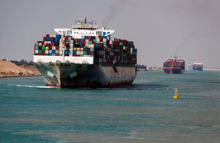 Shipping containers pass through the Suez Canal in Suez, Egypt February 15, 2022. 