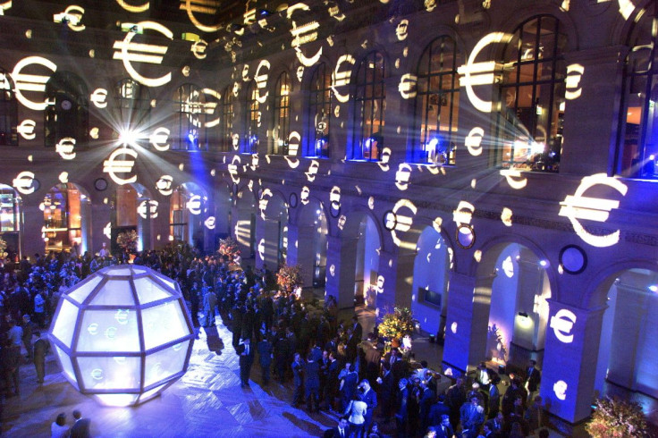 A multitude of the new euro currency symbols are projected on the walls of the Paris Bourse (stock exchange) during a gala evening to mark the first day of trading in the new European currency