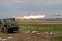 Service members of pro-Russian troops fire a BM-21 Grad multiple rocket launch system during fighting in Ukraine-Russia conflict near a plant of Azovstal Iron and Steel Works in the southern port city of Mariupol, Ukraine May 2, 2022. 