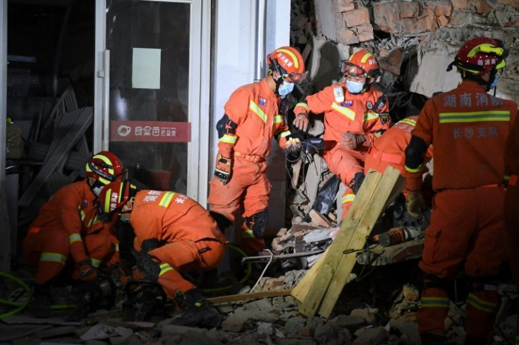Hundreds of emergency workers have been deployed to the site of a building collapse in Changsha, central China