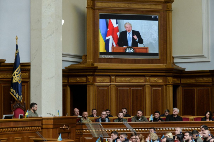 Ukraine's President Volodymyr Zelenskiy attends a session of a parliament while British Prime Minister Boris Johnson addresses Ukrainian lawmakers via videolink, as Russia's attack on Ukraine continues, in Kyiv, Ukraine May 3, 2022. 