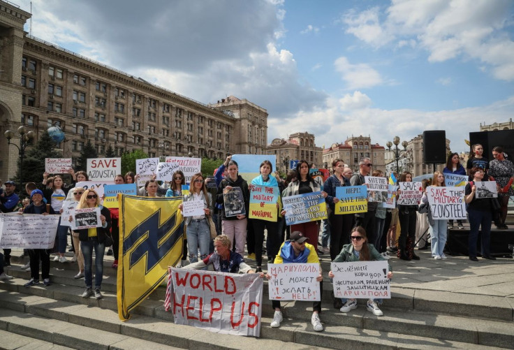 People take part in a rally demanding international leaders to organise a humanitarian corridor for evacuation of Ukrainian military and civilians from Mariupol, amid Russia's invasion of Ukraine, in central Kyiv, Ukraine May 3, 2022.