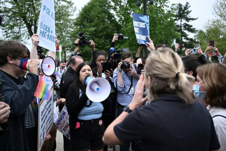 Demonstrators on both sides of the abortion debate square off in front of the US Supreme Court, which appears poised to strike down the right to the procedure in the United States and leave states to determine the legality of abortion