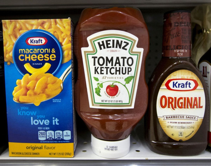 A Heinz Ketchup bottle sits between a box of Kraft macaroni and cheese and a bottle of Kraft Original Barbecue Sauce on a grocery store shelf in New York March 25, 2015.