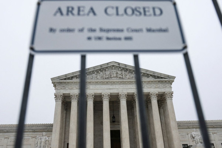 A sign is seen outside the U.S. Supreme Court after the leak of a draft majority opinion written by Justice Samuel Alito preparing for a majority of the court to overturn the landmark Roe v. Wade abortion-rights decision later this year, in Washington, U.