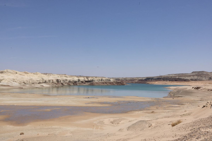 Water recedes near Lone Rock Beach, a popular recreational area that used to be underwater, at Lake Powell.  