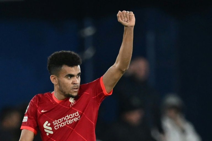 Luis Diaz celebrates scoring his team's second goal as Liverpool beat Villarreal 3-2 on Tuesday to advance to the Champions League final.