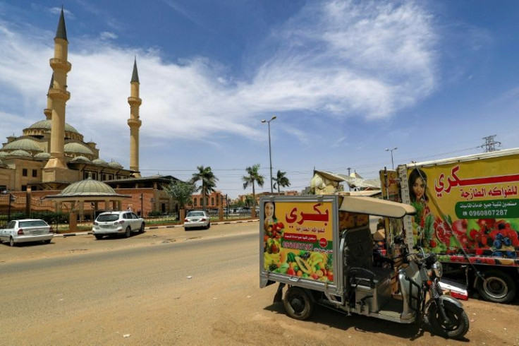 A fruit seller's electric rickshaw in North Khartoum