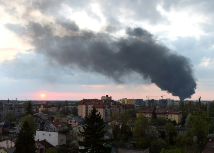 Dark smoke rises following an air strike in the western Ukrainian city of Lviv