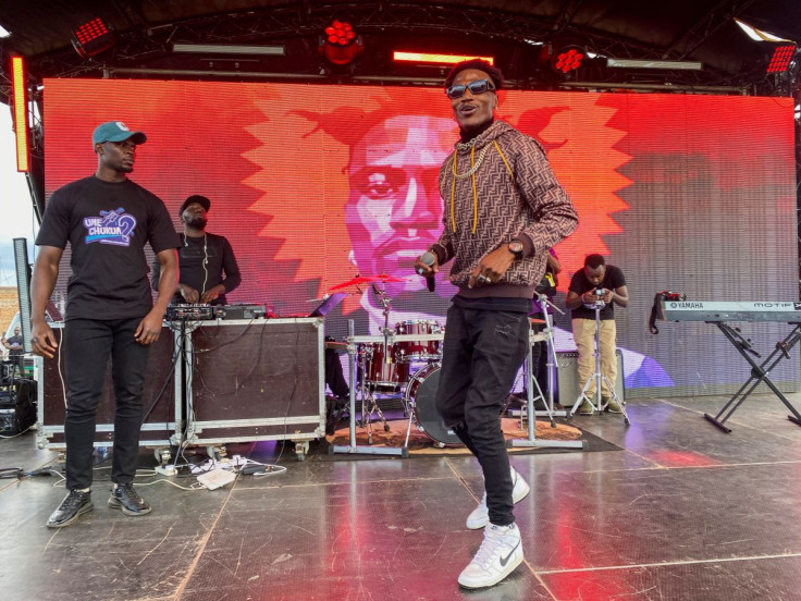 Kenyan rapper and activist Octopizz preforms during a concert promoting registration to vote in the August 2022 Kenyan general elections, in Eldoret, Kenya, April 23, 2022.