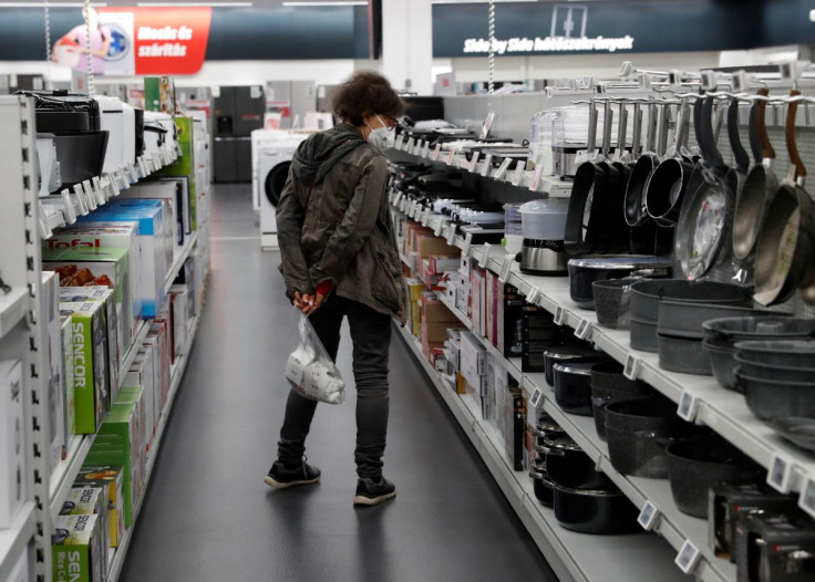 A woman shops at consumer electronics retailer Media Markt in Budapest, Hungary, May 2, 2022.