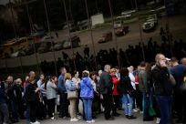 Ukrainian evacuees queue for aid at a donation collection point, amid Russia's invasion of Ukraine, in Zaporizhzhia, Ukraine May 4, 2022. 