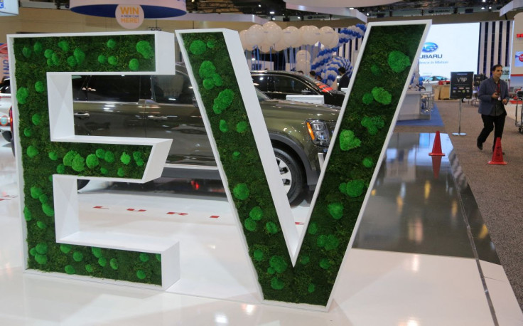 A sign promoting electric vehicles is displayed during the media day at the Canadian International AutoShow in Toronto, Ontario, Canada, February 14, 2019. 