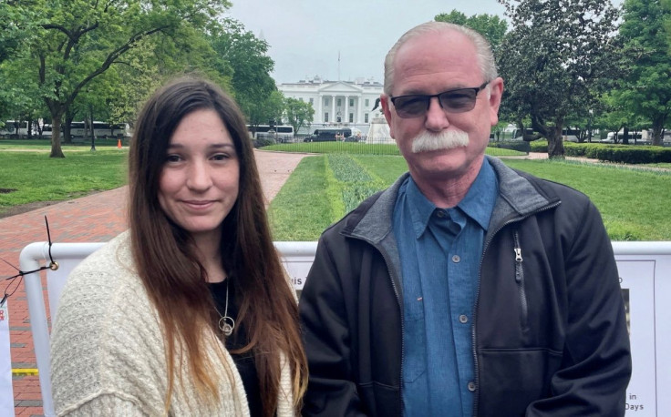 Released detainee Trevor Reed?s father Joey and his sister Taylor Reed pose for a photograph, while gathering with families of other detainees outside the White House in Washington, D.C. May 4, 2022. 