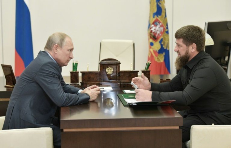 Loyal 'foot soldier': Chechnya's strongman leader Ramzan Kadyrov (right) is fiercely loyal to Russian President Vladimir Putin