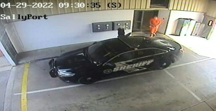 This video grab taken from handout footage released by the Lauderdale County Sheriff's Department shows Casey White, an inmate at the Lauderdale Co. Detention Facility escaping with the help of guard Vicky White on April 29, 2022