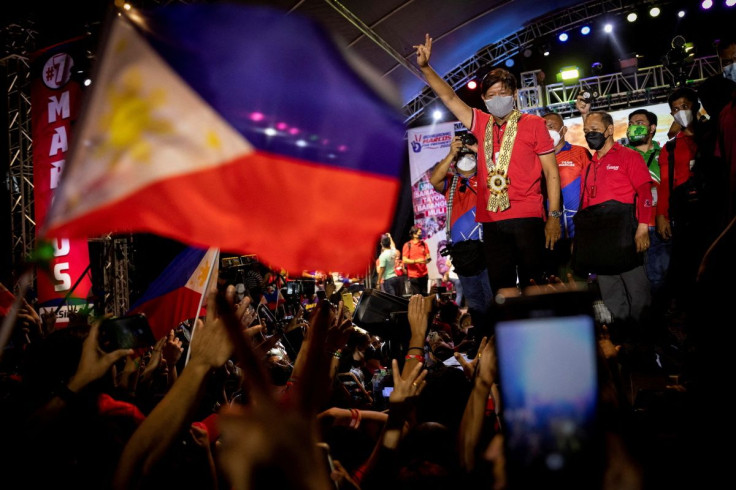 Philippine presidential candidate Ferdinand "Bongbong" Marcos Jr., son of late dictator Ferdinand Marcos, gestures with a victory sign during a campaign rally in Lipa, Batangas province, Philippines, April 20, 2022.