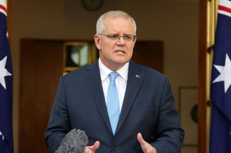 Australian Prime Minister Scott Morrison has called for calm after his Solomon Islands' counterpart cited a 'warning of military intervention' after his country's deal with China