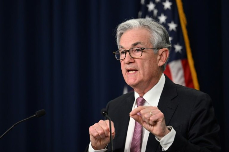 Markets ralled after the US Federal Reserve played down chances of a huge interest rate hike in the near future