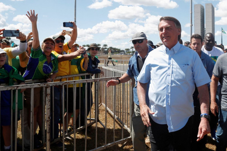 Brazilian President Jair Bolsonaro meets supporters during a demonstration "For Freedom and for Brazil", in Brasilia, Brazil May 1, 2022.
