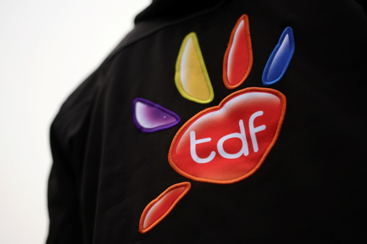The logo of TDF (TeleDiffusion de France) is seen on a jacket of an employee during the installation of a new telecom transmission antenna on the top of the Eiffel tower in Paris, France, March 15, 2022.